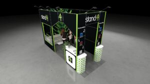 View of a modular, two-open-side 5x2m exhibition stand featuring tall branded walls, a white sofa in a recessed lounge area, a white reception desk, and two cylindrical foreground display units. The stand is optimized for both informal meetings and direct visitor engagement.
