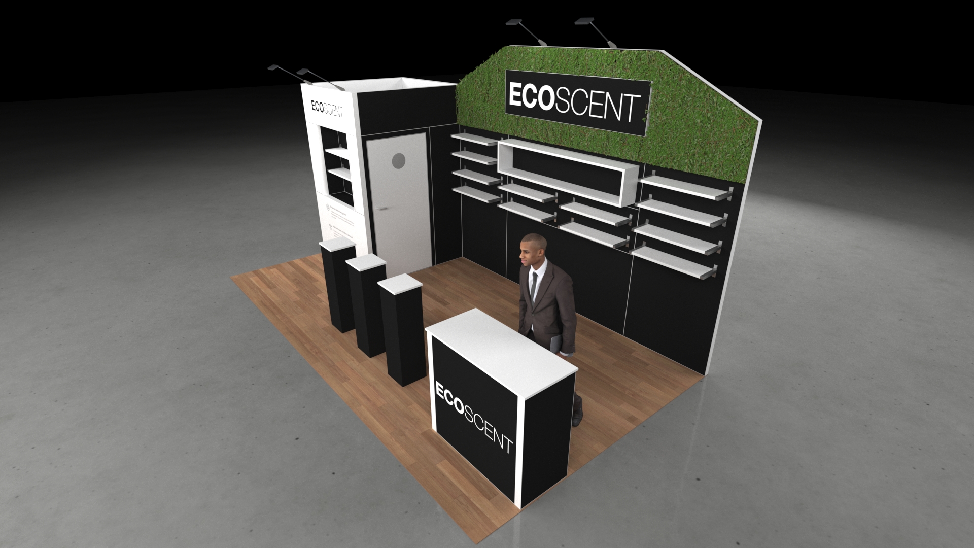 A 6x3 metre exhibition stand. The design features a large central green wall backdrop and a prominent reception counter. The stand incorporates multiple product shelving units and three black presentation plinths.