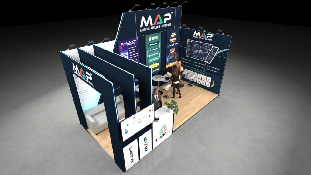 High-impact, multi-zone exhibition stand with high walls creating separate private lounge areas. Features numerous digital screens and a prominent overhead header.