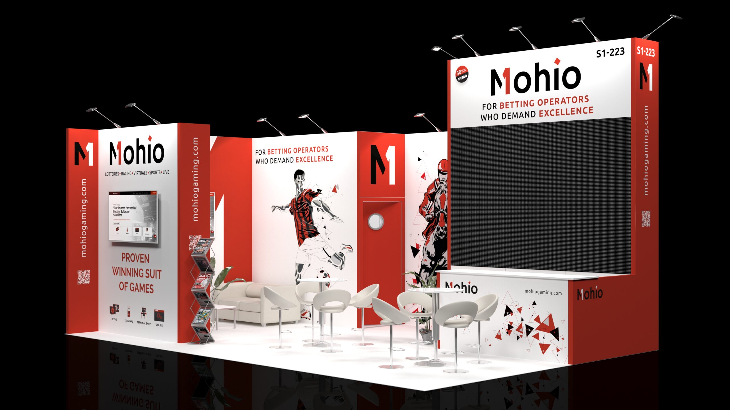 Exhibition stand with prominent digital screens and walls for graphics. There's a comfortable lounge area, a casual meeting table with chairs, and overhead spotlights.
