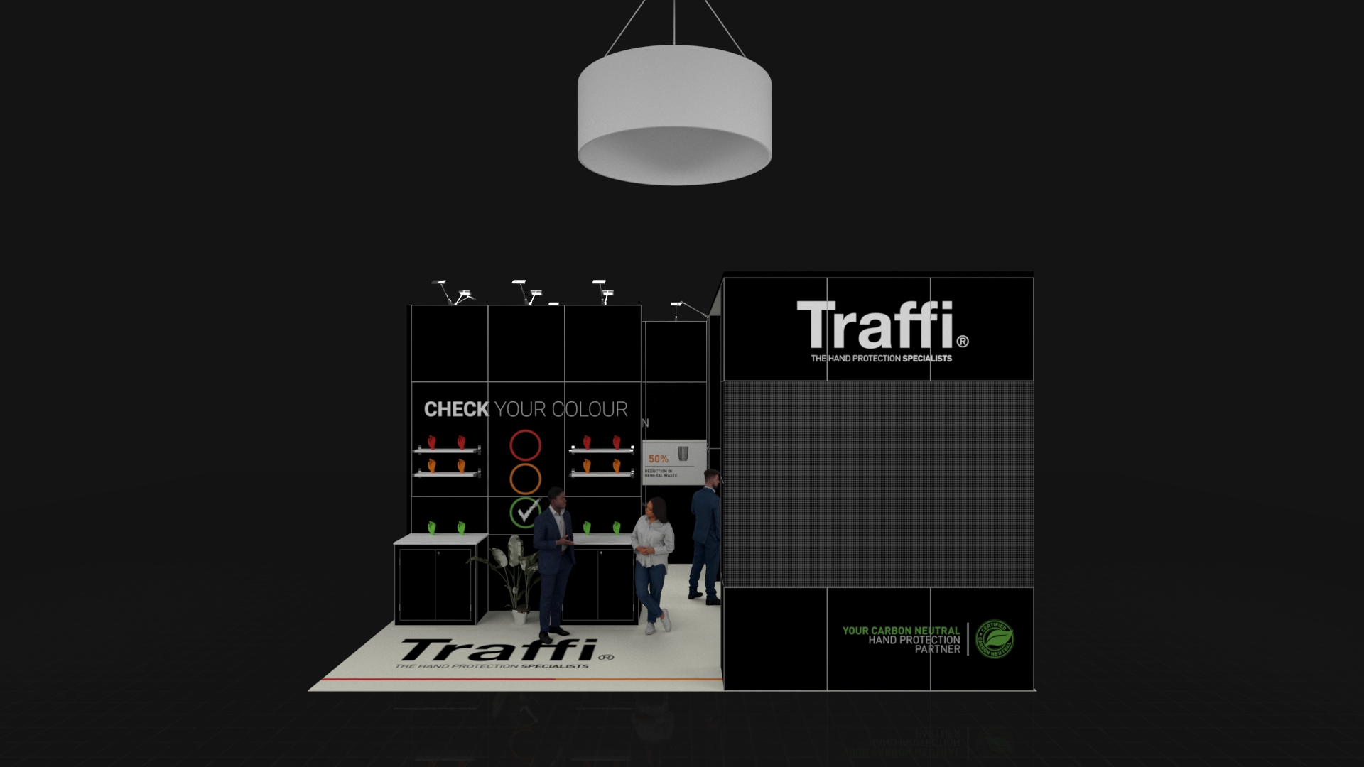 Modern exhibition stand with tall panels, glove displays, floor graphics, and a large circular hanging light above. Several people are interacting around the booth.