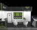 3D rendering of an exhibition stand design featuring a front reception counter, a central meeting area with four round lounge chairs, built-in wall display shelves, a small refreshment station, and a closed door leading to a private storage room.